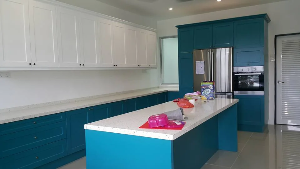 Blue and white shaker kitchen with island