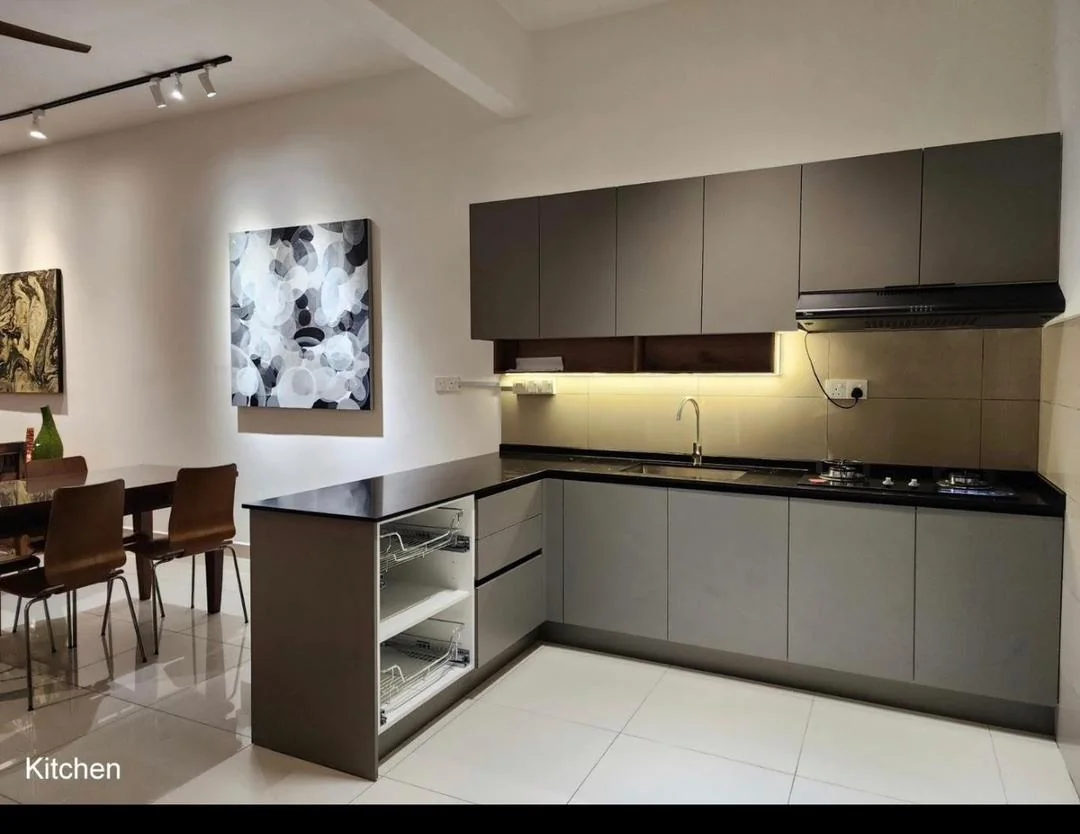Charcoal upper and grey base cabinets with black worktop